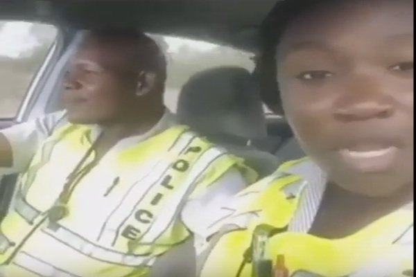 police officers singing Vybz kartel touch down